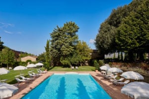 View of Pool and sightseeing Villa di Piazzano SLH Luxury Hotel Cortona tuscany
