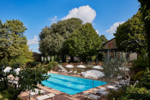 View of Pool and sightseeing Villa di Piazzano SLH Luxury Hotel Cortona tuscany
